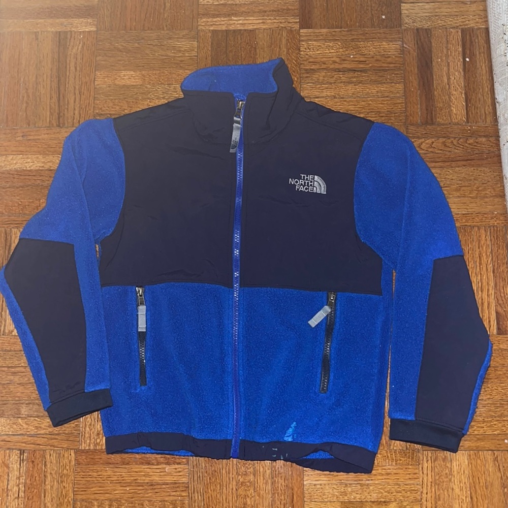 The North Face blue and black full zip jacket size 7/8 stain on front bottom